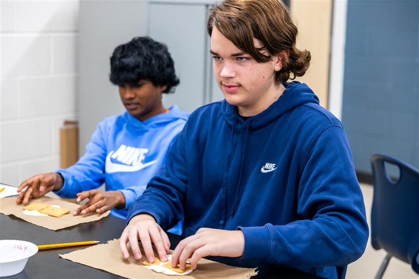 Students do a science experiment